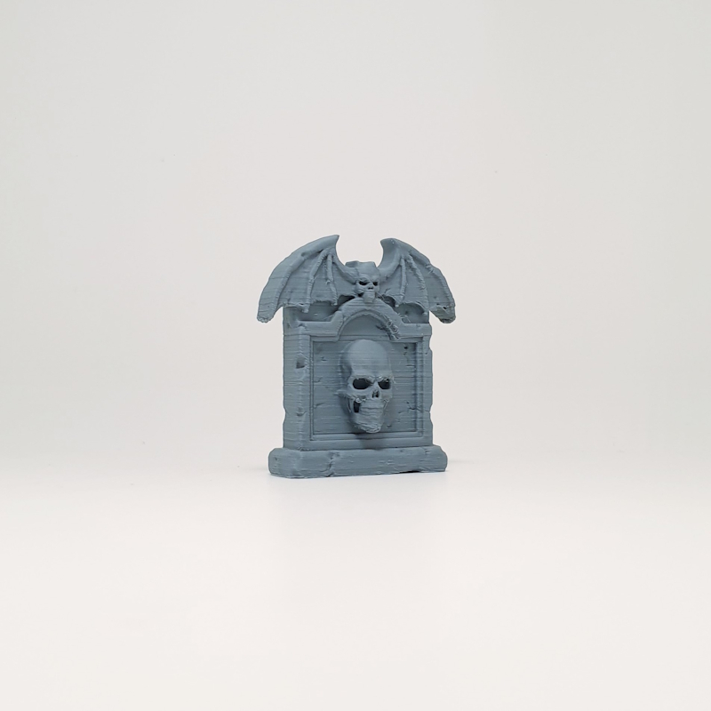 Bat-Winged Crest Skull Headstone