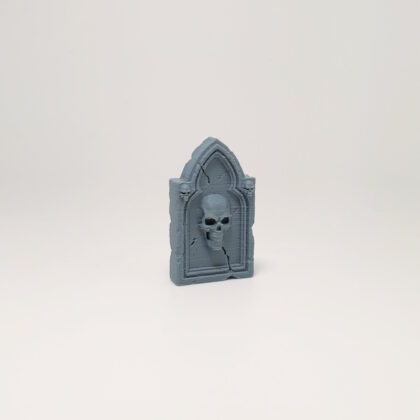 Fissured Arch Skull Headstone