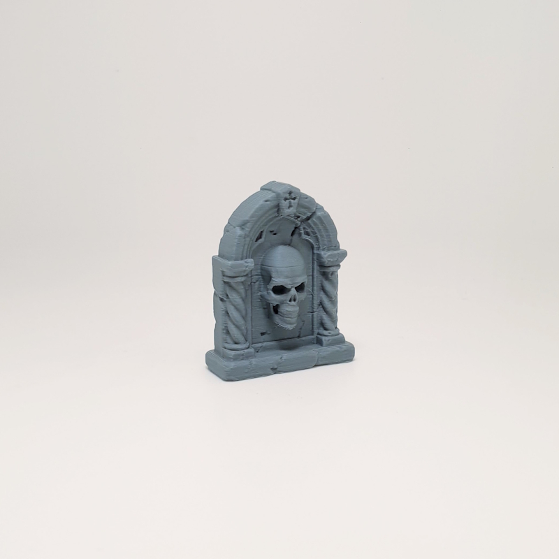 Pillared Arch Skull Headstone