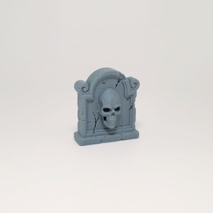 Scroll-Flanked Skull Headstone