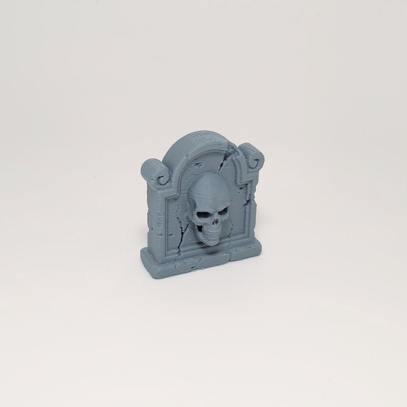 Scroll-Flanked Skull Headstone - Image 2